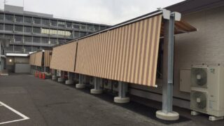 オーニングテントを建物の側面に施工