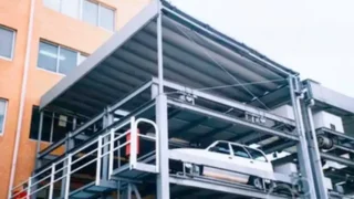 立体駐車場に開閉式テント屋根を施工